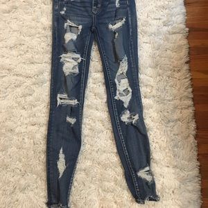 AE high rise super distressed jeans